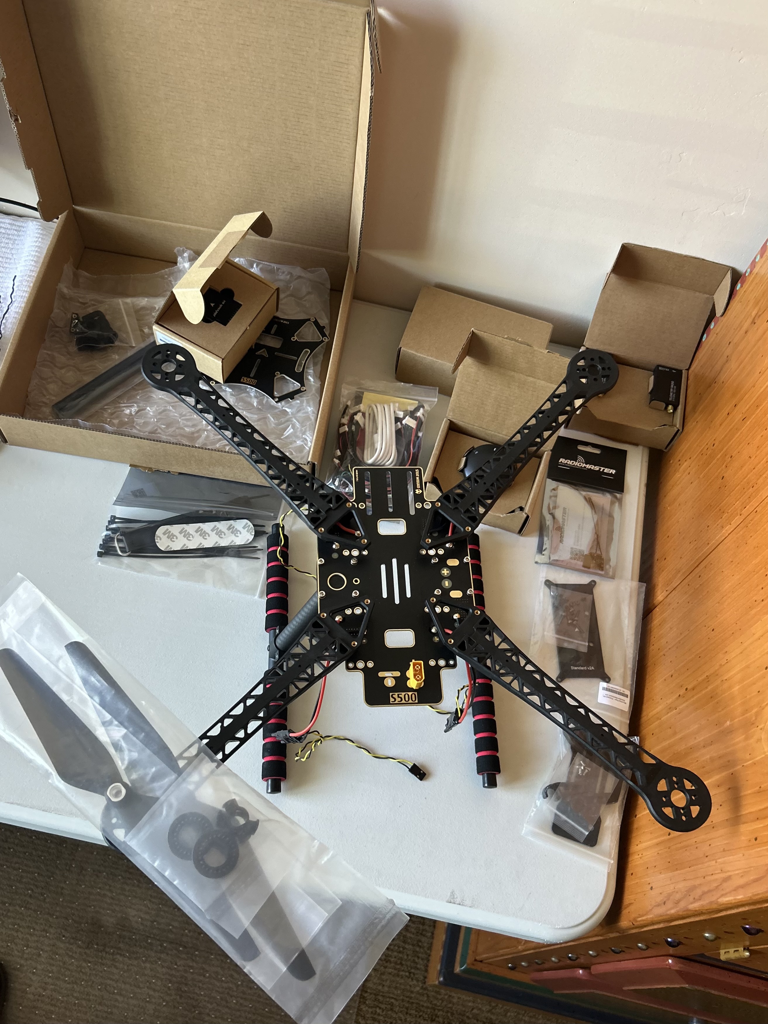 Holybro S500 bare frame assembled on the desk before the flight controller stack was mounted.